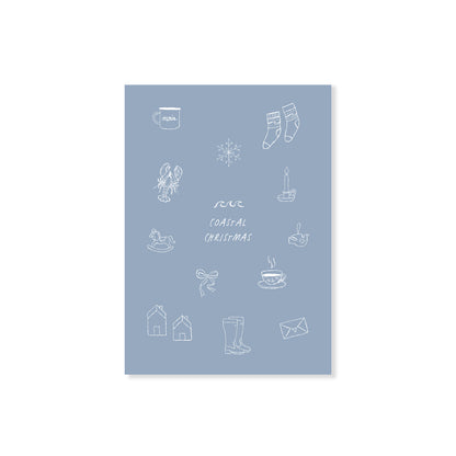 Blaue Postkarte mit dem Schriftzug „Coastal Christmas“ und liebevollen nordischen, maritimen Illustrationen auf schlichtem Hintergrund.
