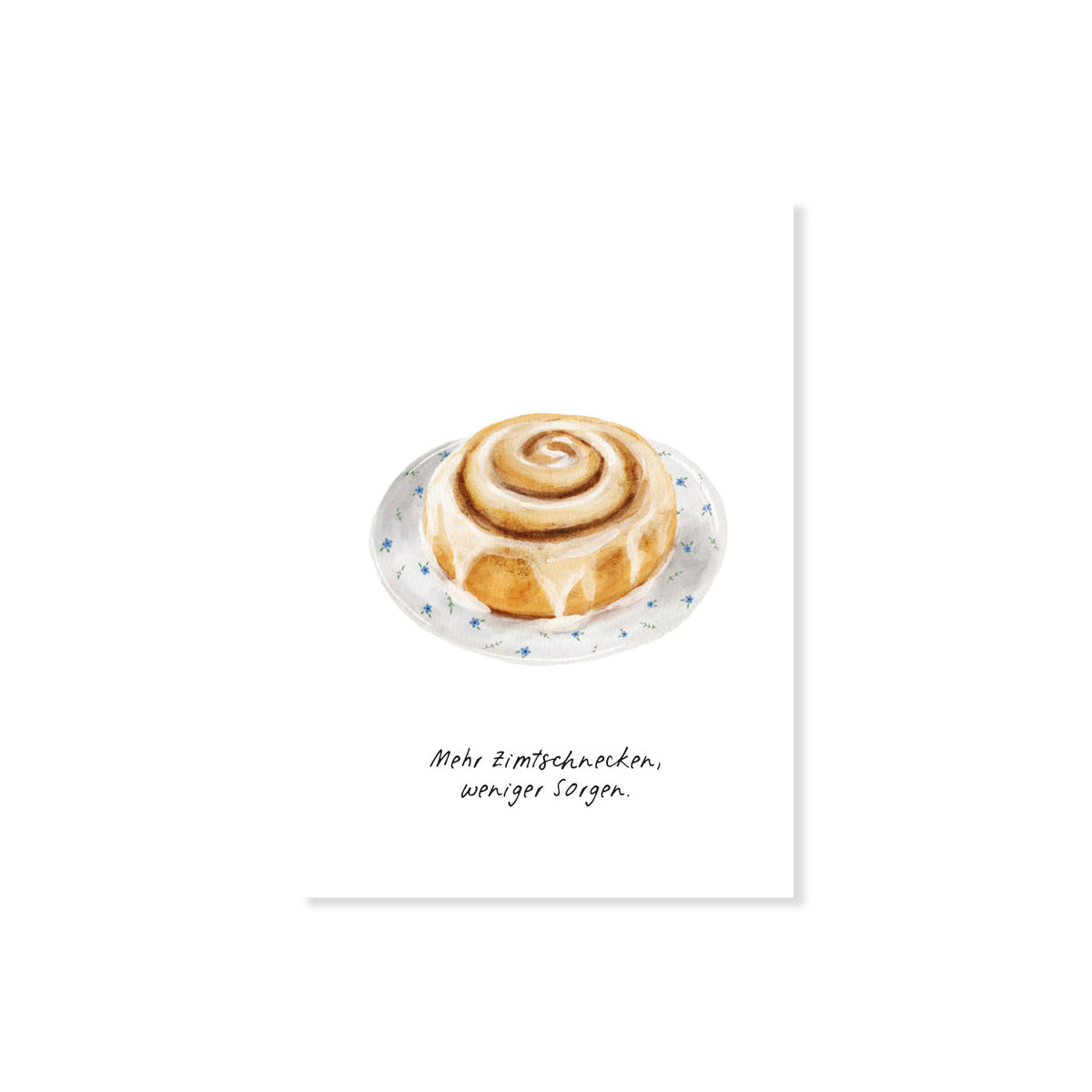 Postkarte Zimtschnecke mit Spruch 'Mehr Zimtschnecken, weniger Sorgen', Nahaufnahme auf weißem Hintergrund.