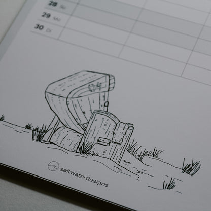 Detail Aufnahme vom Kalender 2026 von der Illustration Strandkorb in den Dünen.